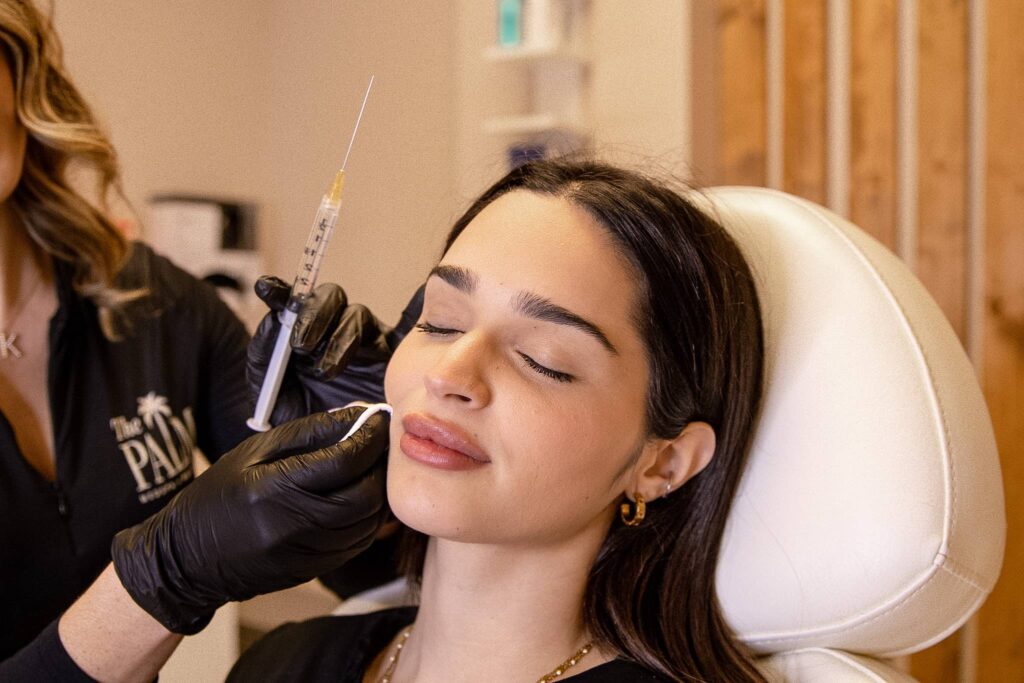 Woman getting injectable treatment